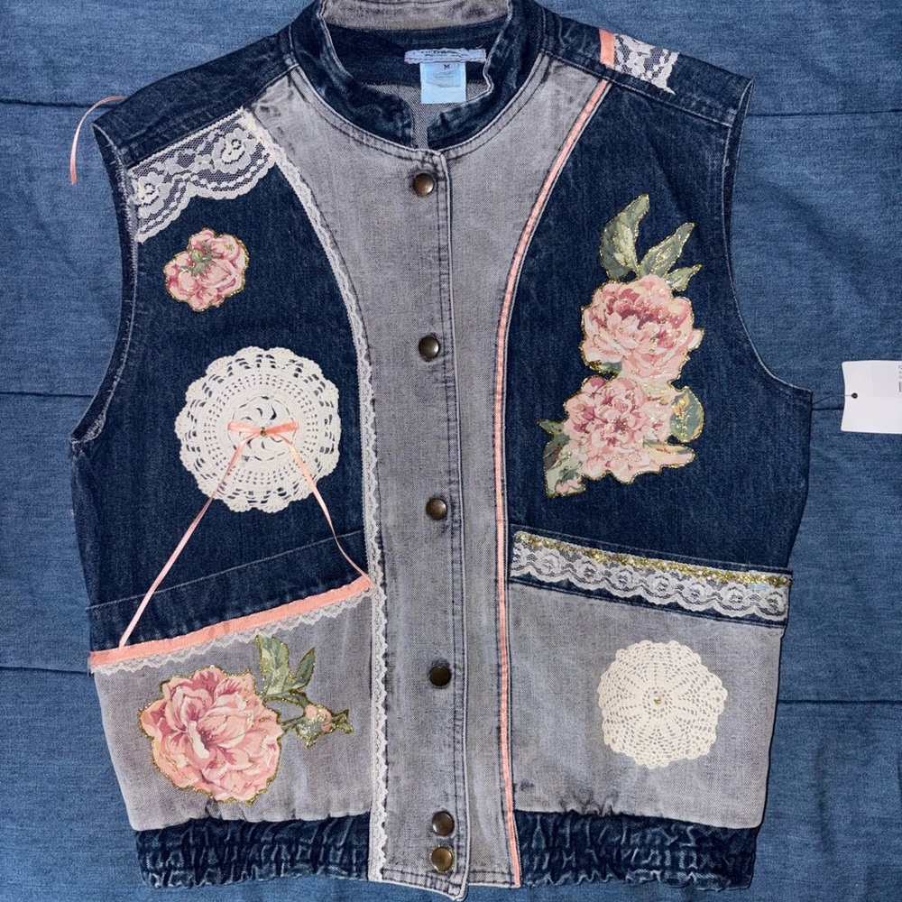 Embroidered denim vest with floral and lace details